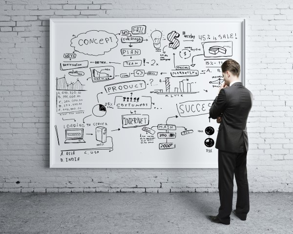 Man at drawing board